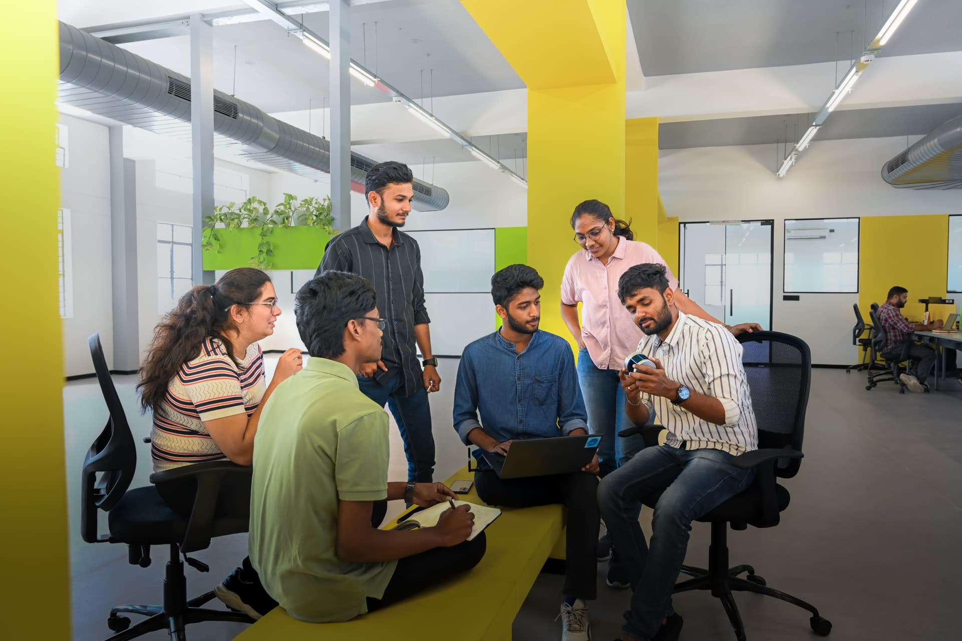 Team at Virya collaborating in the office